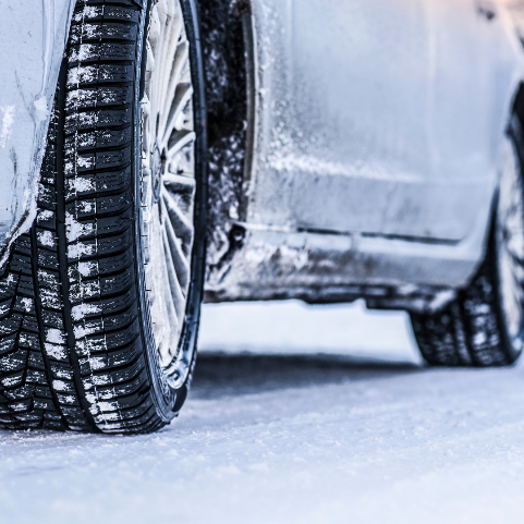 A close up of a car tire

Description automatically generated